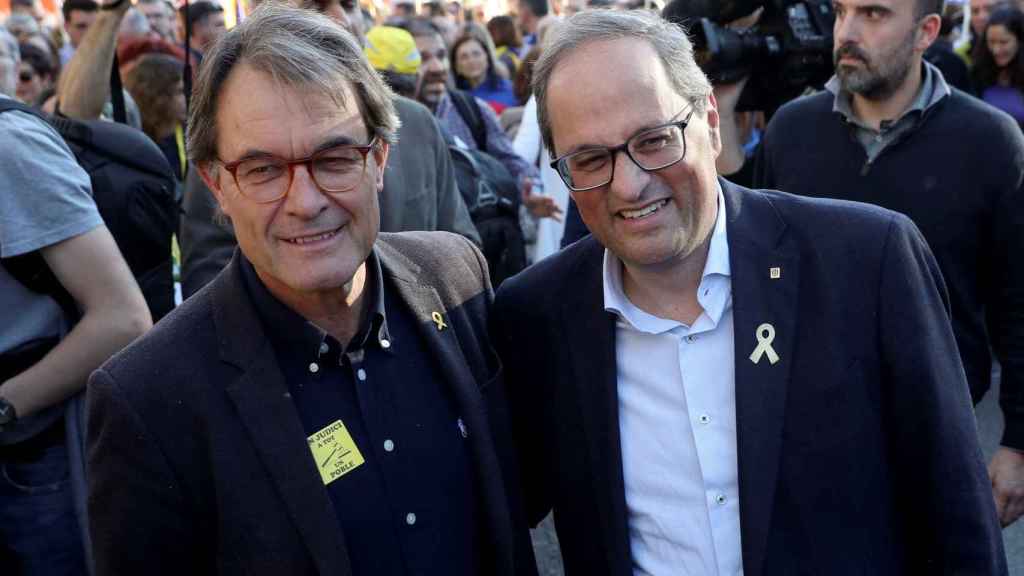 Quim Torra y Artur Mas posan felices en Madrid durante la marcha separatista en Madrid.